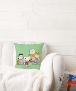 Snoopy And The Gang Play Football Throw Pillow 2
