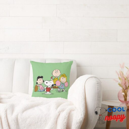 Snoopy And The Gang Play Football Throw Pillow 2