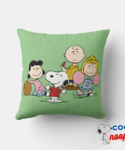 Snoopy And The Gang Play Football Throw Pillow 4