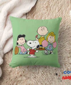 Snoopy And The Gang Play Football Throw Pillow 8